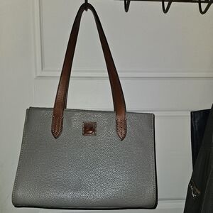 Dooney & Bourke purse. Excellent condition.  Light gray in color